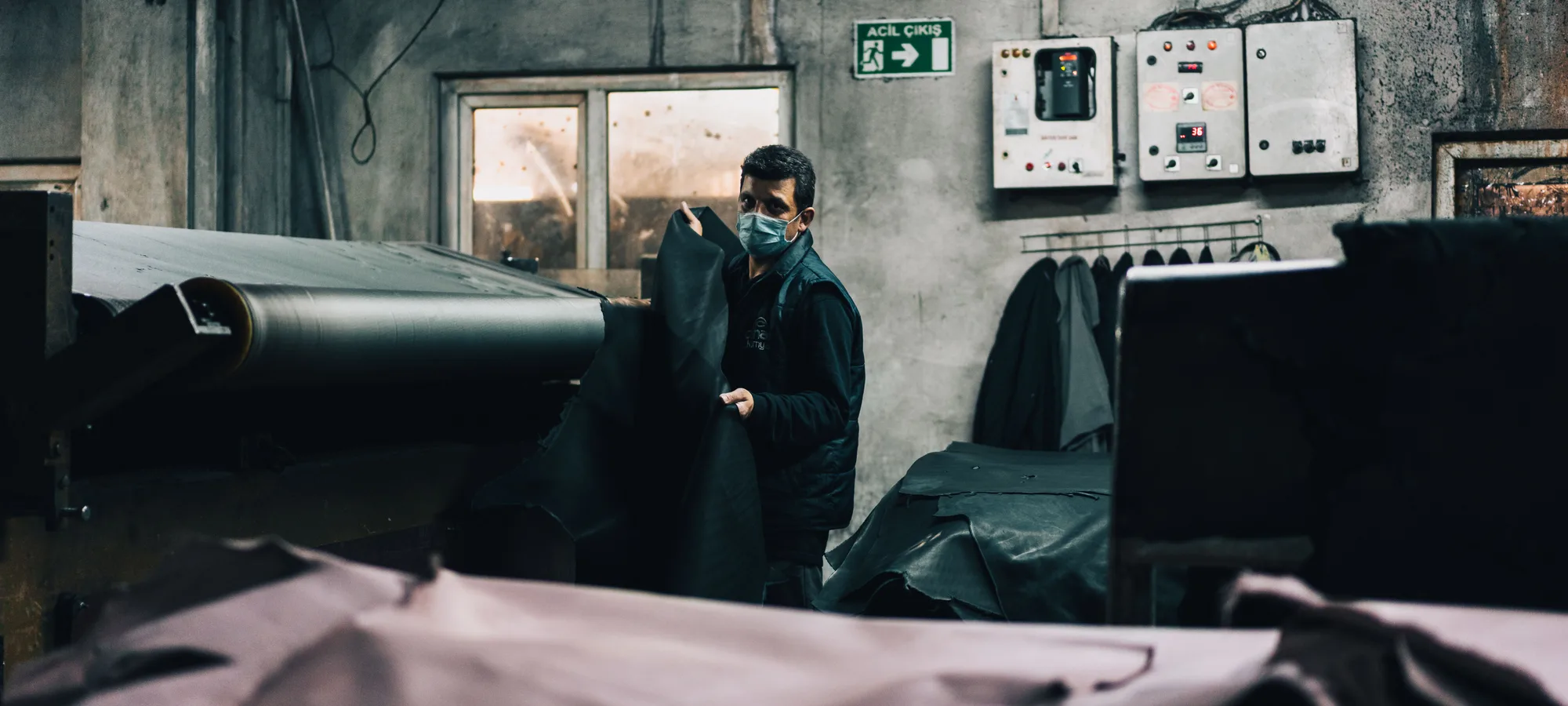 Material-led manufacture where the buyer qualifies the tannery and the finish, not the assembler.